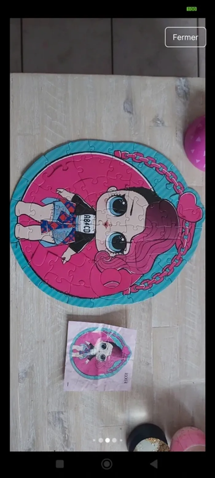 Puzzle LOL complet avec sa boîte de rangement en forme de boule - photo numéro 5