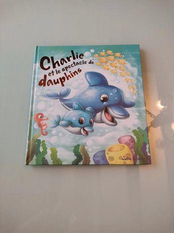 Livre charlie et le spectacle de dauphins