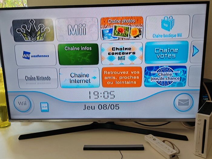 Lot console Wii blanche avec manette et jeux - photo numéro 15