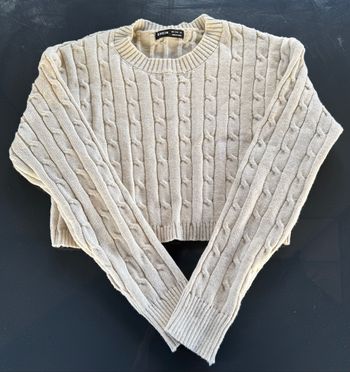 Pull court crème