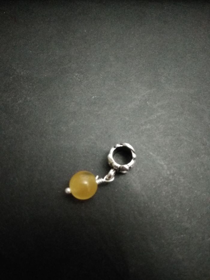 Pendentif boule jaune