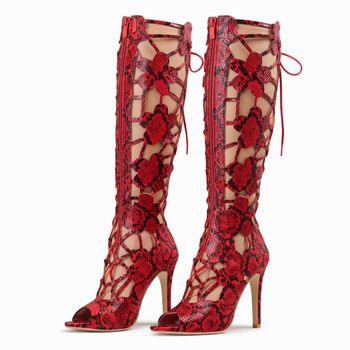 Bottes montantes rouges effet python