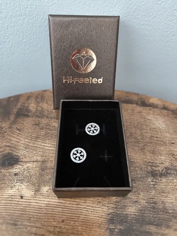 Boucle d'oreille flocon de neige en argent neuve