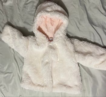 Manteau 6 mois en bon état