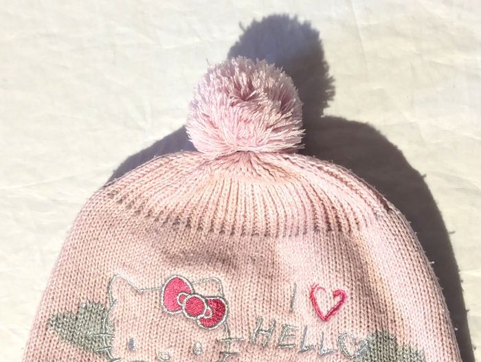 Bonnet Cache Oreilles Dessin Chat Ruban Ecriture Hello Kitty Tresses Pompon Accessoire Petits Enfant - photo numéro 2