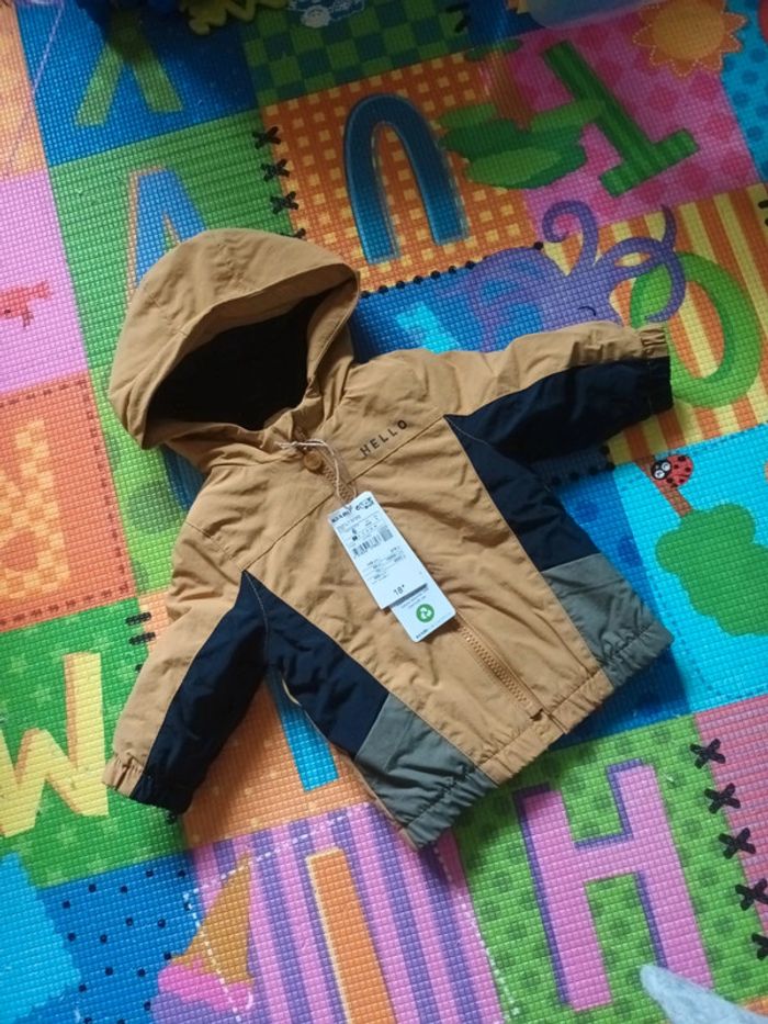 Manteau 6mois neuf