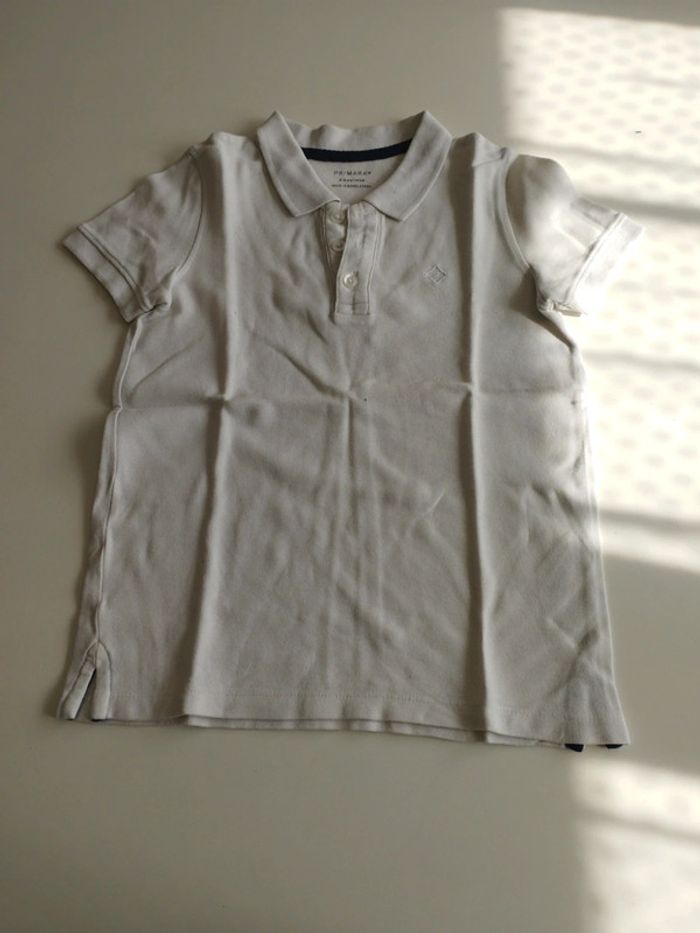 Polo blanc T 8-9 ans