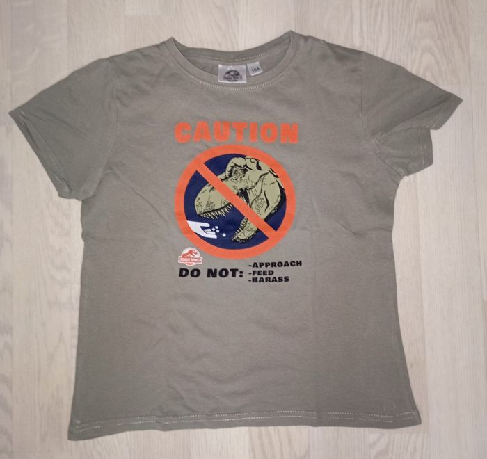 Tee-shirt kaki motif dinosaure Jurassic World
T. 10 ans