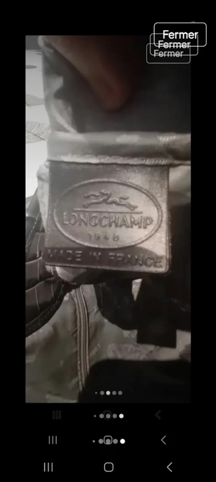 Sac longchamp grande capacité en porte épaule en cuir croco l état du sac en photo 
26x37x12 - photo numéro 13