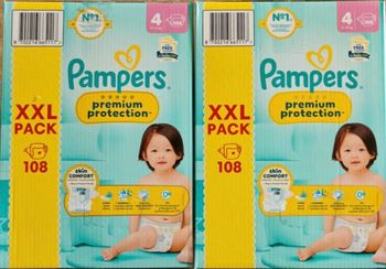 2 cartons de couches Pampers  taille 4