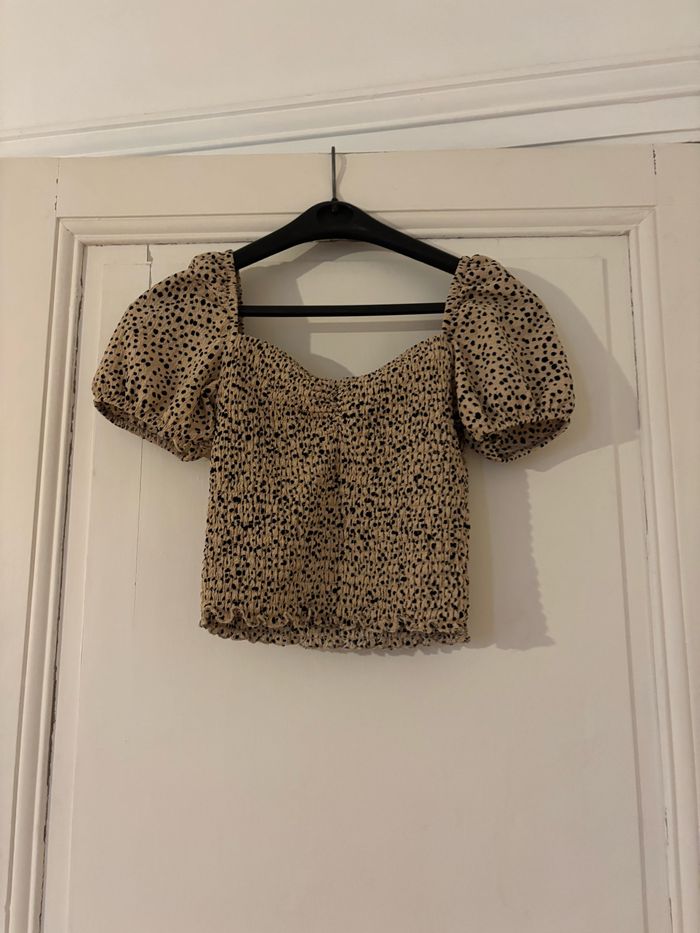 Top léopard