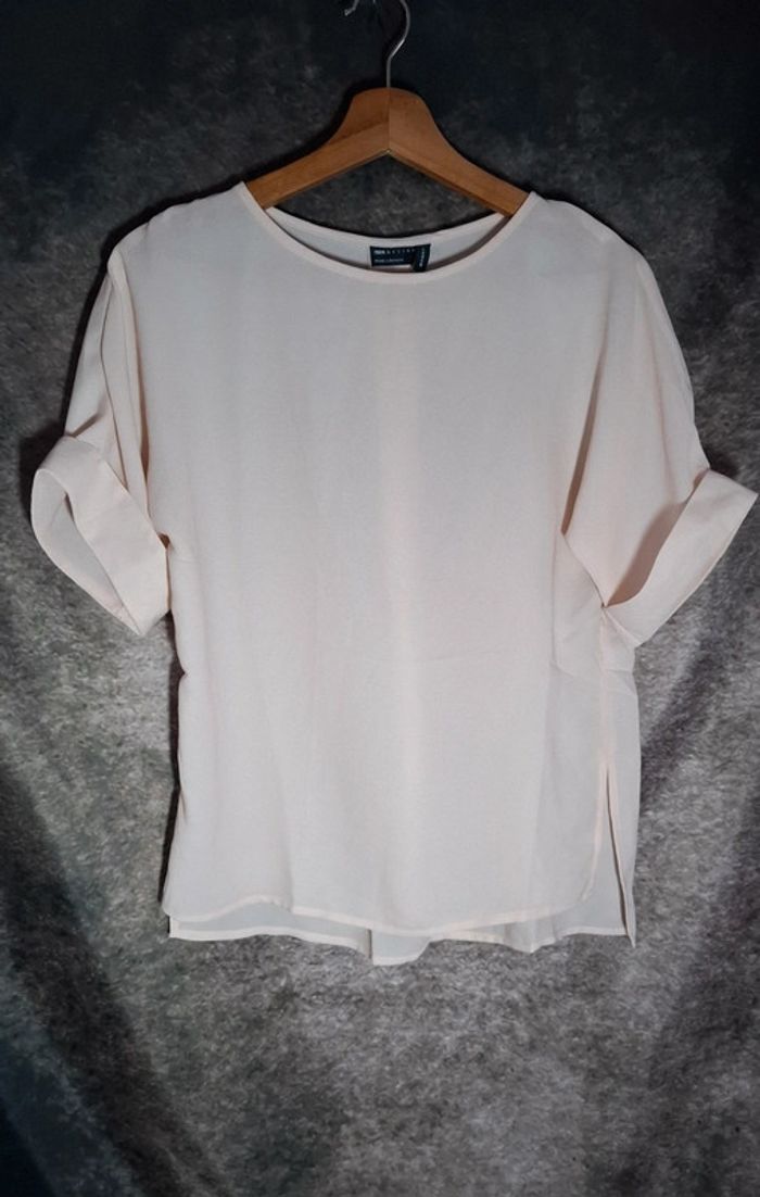 Blouse élégante nacre