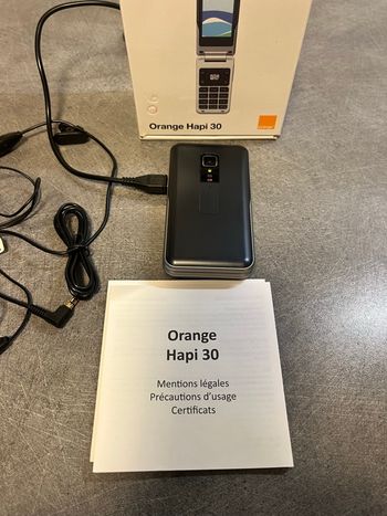 Téléphone à clapet orange noir 