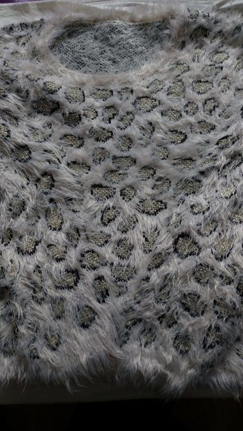 Pull duveteux léopard