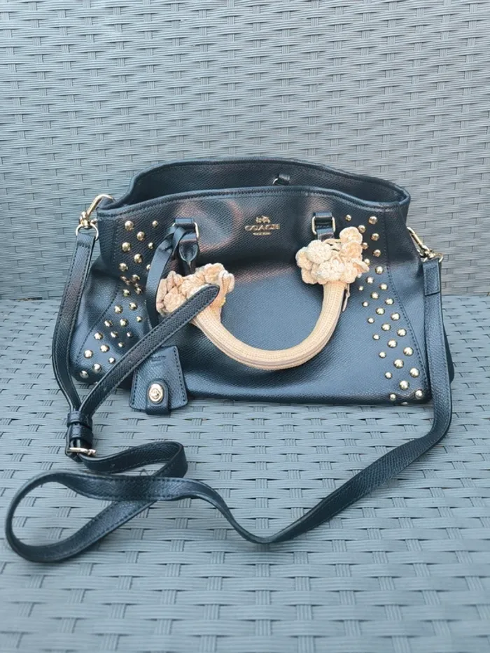 Sac à main cuir bleu et fleur en tissu Coach