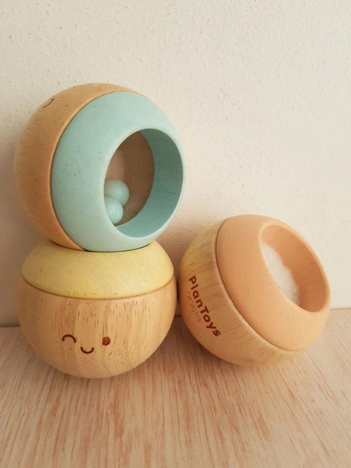 Têtes sensorielles culbuto pastel en bois de Plan toys