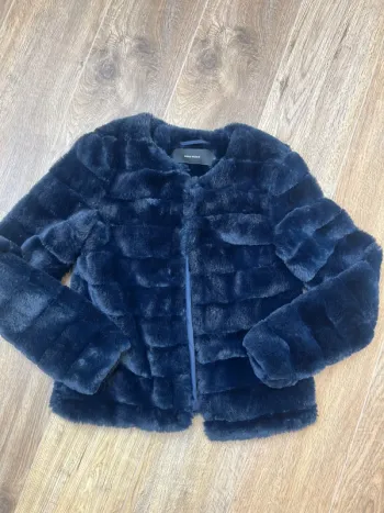 Veste fausse fourrure