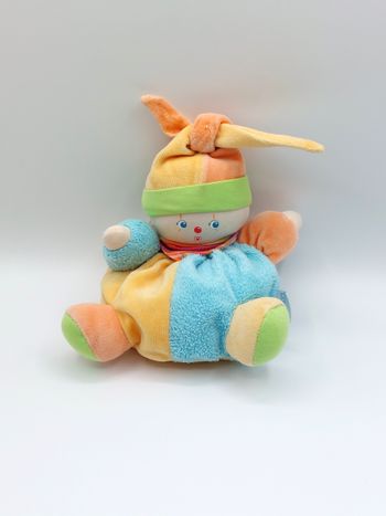 Doudou peluche clown COROLLE 2006 bleu jaune vert orange 20 cm bandana rayures