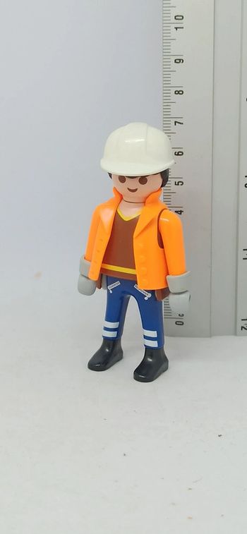 Homme avec casque blanc et gilet orange playmobil