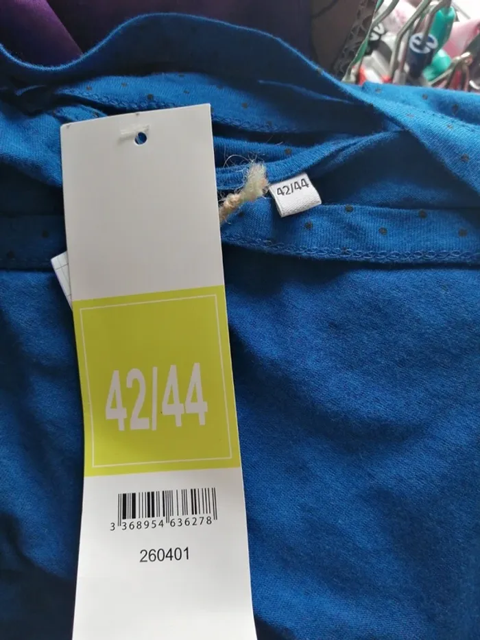 Robe sans manches bleu à pois noir lien à nouer découpes dans le dos / sans marque / (42-44) - photo numéro 8
