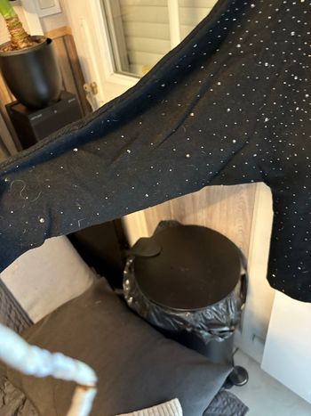 Pull ras de cou noir à sequins