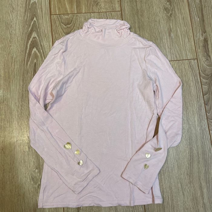 Col roulé rose à cœur