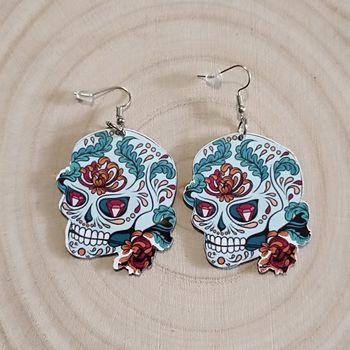 Boucle d'oreille tête de mort