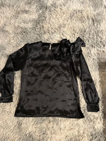 Haut noir de soirée