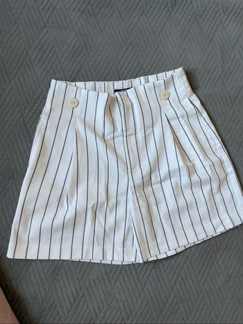 Short classe Kiabi taille 34 noir et blanc avec 2 poches à l’avant