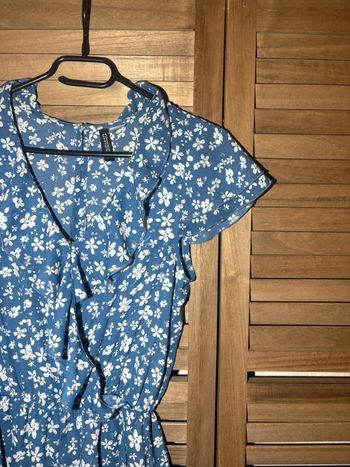 Combishort bleu à fleurs blanche taille 32 XXS