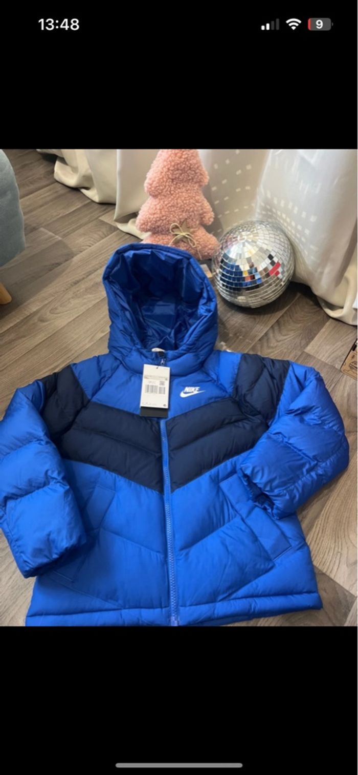 Doudoune Nike bleu neuf - photo numéro 2