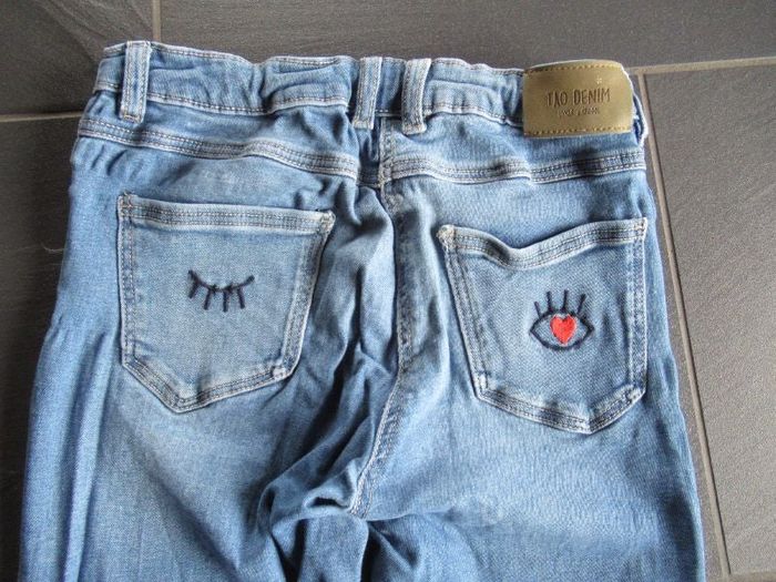 Jean's fille Tape à l'oeil 12 ans + don d'un pantalon de jogging Vertbaudet