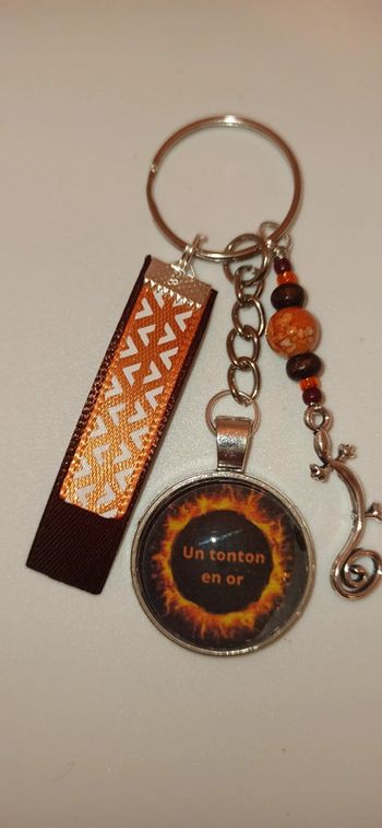 Cadeau tonton, porte clé message " tonton en or"