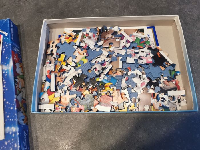 Boîte de 3 puzzles Disney 49 pièces. - photo numéro 2