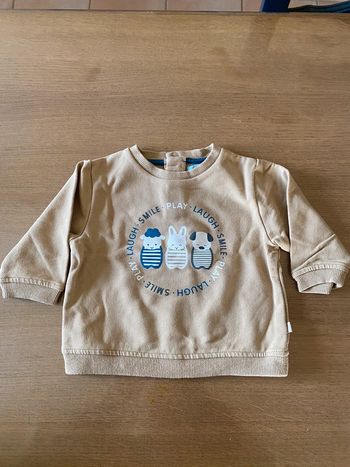 Pull marron animaux
