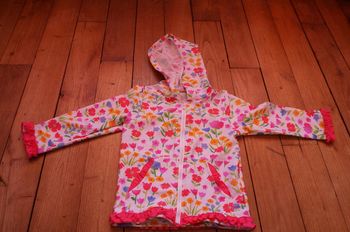 Splendide veste à fleurs matière style maillot de bain 2 ans 2,50€