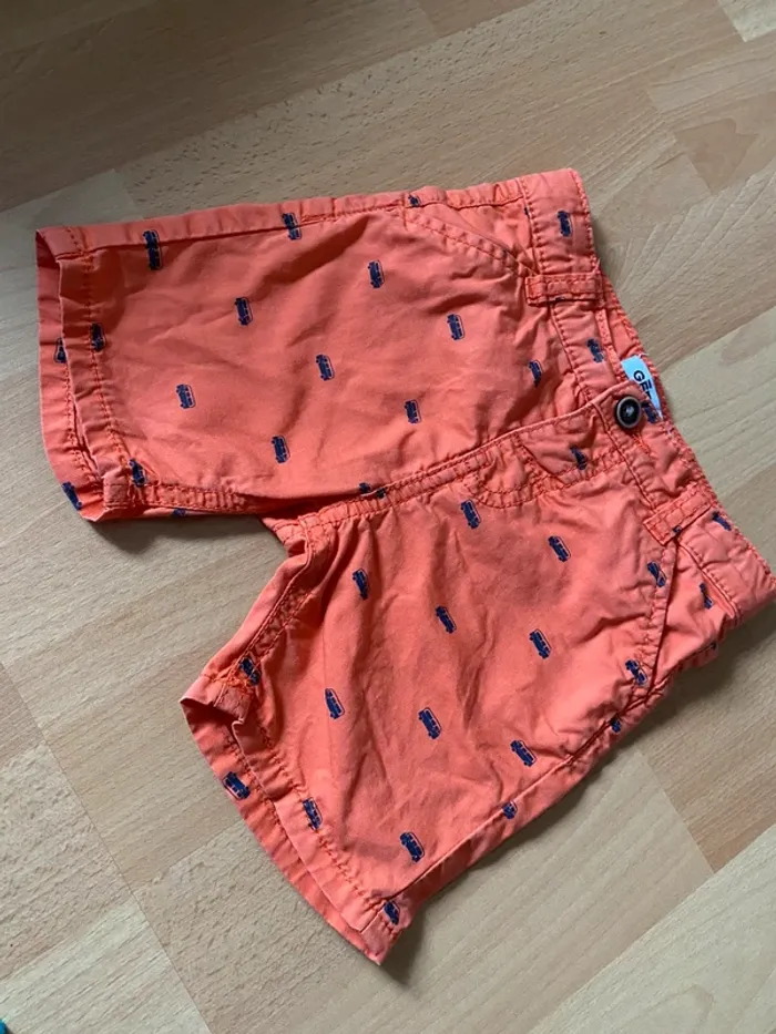 Short orange motif bus Gémo Taille 12 M