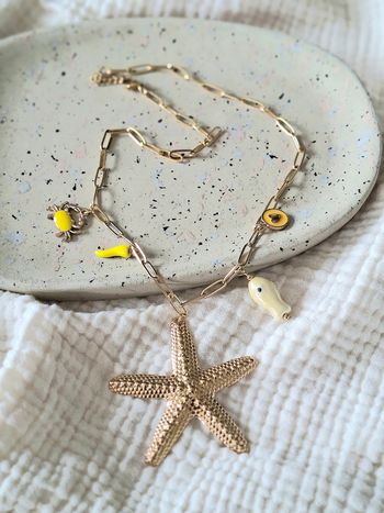 Collier breloques étoile de mer 