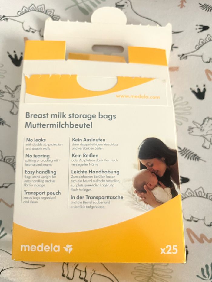 Sac contenant pour lait + 1 biberon stérilisé + 1 petit coussinet d’allaitement +3couches pommettes taille 1 - photo numéro 2