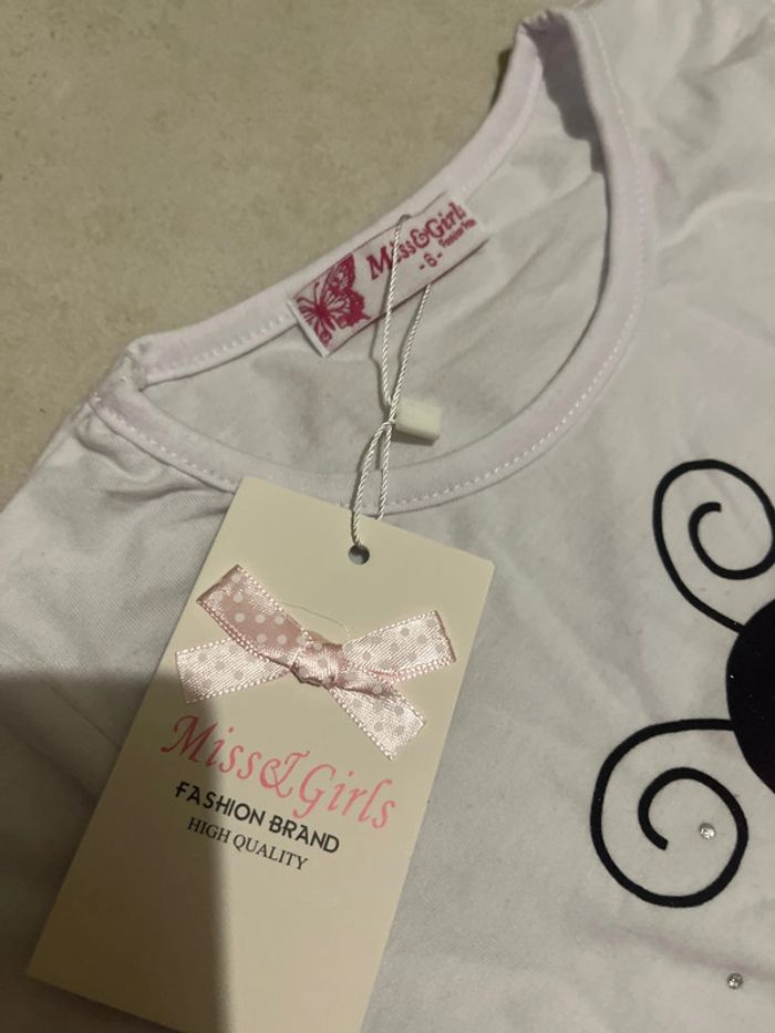 6 ans tee shirt blanc et brillant ! Coccinelle - photo numéro 3