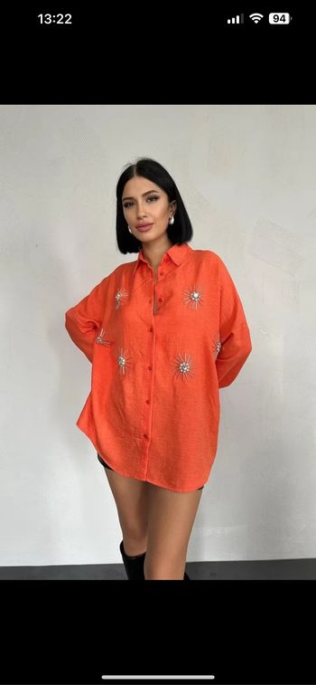 Chemise orange à strass