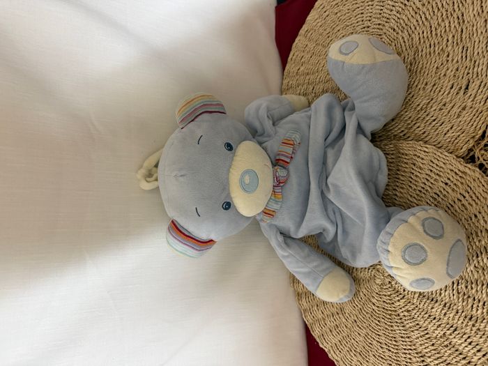 Peluche ours bleu range pyjama Babysun sac à dos