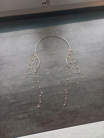Collier punk à pompons dorés