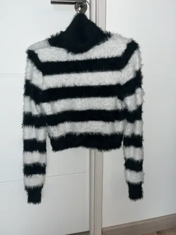 Pull rayé col roulé