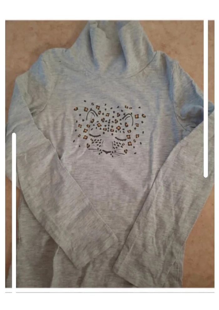 Col roulé neuf 8 ans