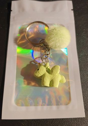 Porté clef pégase et pompom vert