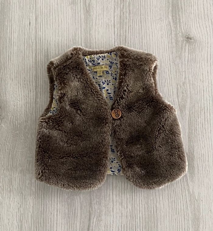 Veste fausse fourrure 6 mois grains de blé