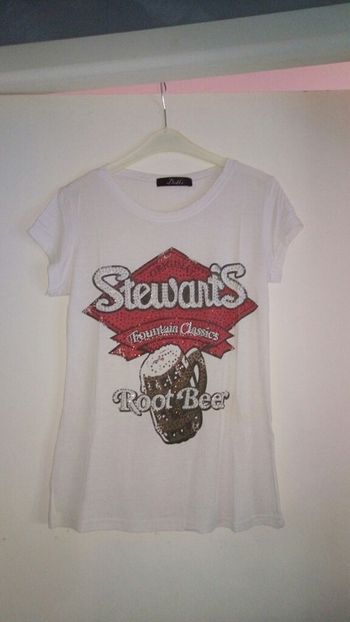 T shirt moulant original comme neuf