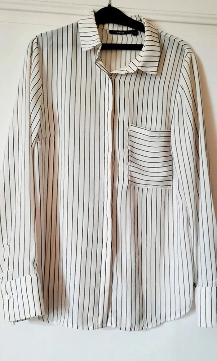 Chemisier blanc à rayures