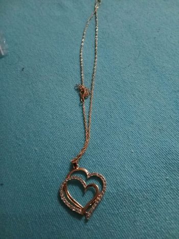 Collier doree 2 cœurs neuf